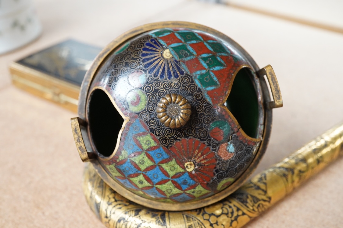 A Japanese damascened iron parasol handle, a cloisonné enamel koro and Komai style mirrored musical compact, largest 24cm in length